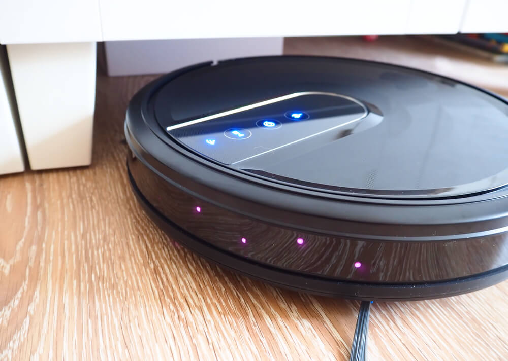 When to Replace Roomba Battery - Roomba robot vacuum cleaner cleaning a specific area